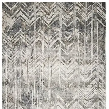 9' X 13' Dark Gray And Ivory Chevron Area Rug