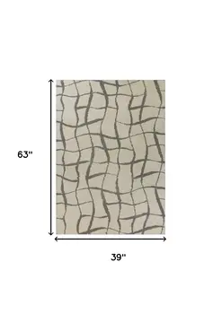 3' X 5' Ivory Abstract Shag Area Rug