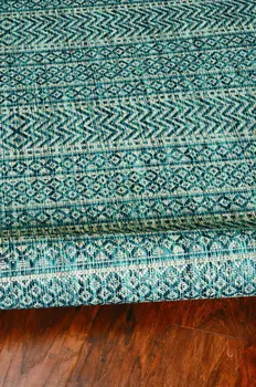 8' X 11' Teal And Beige Geometric Area Rug