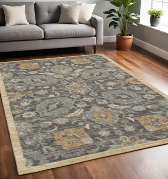 5' X 8' Taupe Orange And Gray Wool Floral Distressed Area Rug