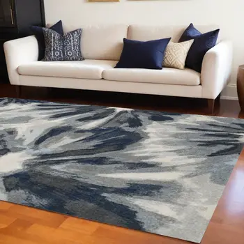 8' X 11' Ivory And Blue Abstract Area Rug