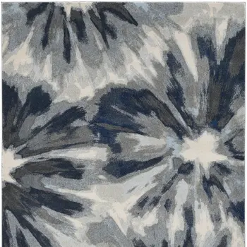 8' X 11' Ivory And Blue Abstract Area Rug