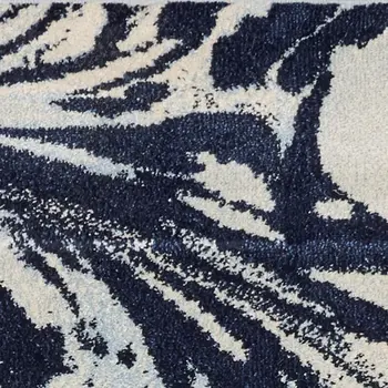 5' X 7' Blue And Ivory Abstract Area Rug
