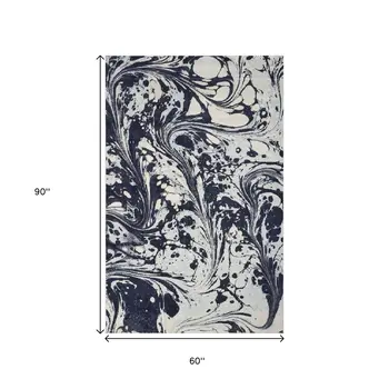 5' X 7' Blue And Ivory Abstract Area Rug