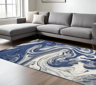 7' X 10' Blue And Beige Abstract Area Rug