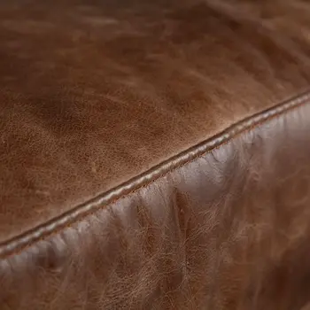 33" Brown And Silver Faux Leather Distressed Arm Chair