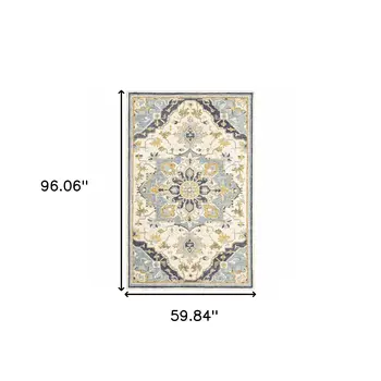 5' X 8' Blue And Ivory Bohemian Area Rug