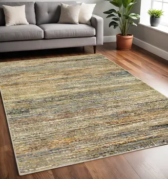 5' X 8' Gold And Green Abstract Area Rug