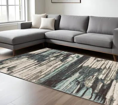 6' X 9' Ivory Blue And Gray Abstract Area Rug