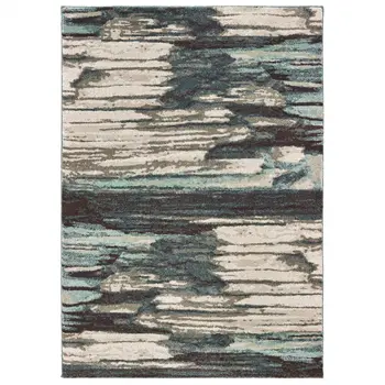 10' X 13' Ivory Blue And Gray Abstract Area Rug