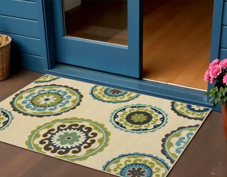 2' X 4' Green And Ivory Floral Indoor Outdoor Area Rug