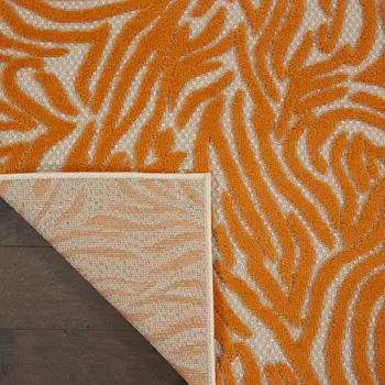 3' X 4' Orange And Ivory Abstract Indoor Outdoor Area Rug