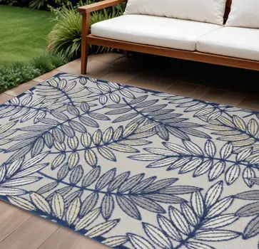 6' X 9' Ivory And Blue Floral Indoor Outdoor Area Rug