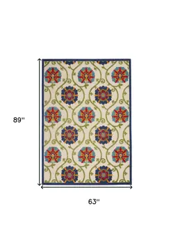 5' X 8' Ivory And Blue Floral Indoor Outdoor Area Rug