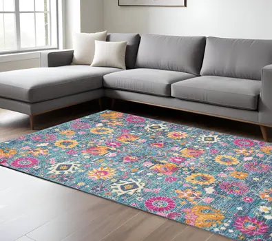 7' X 10' Blue And Orange Floral Distressed Area Rug