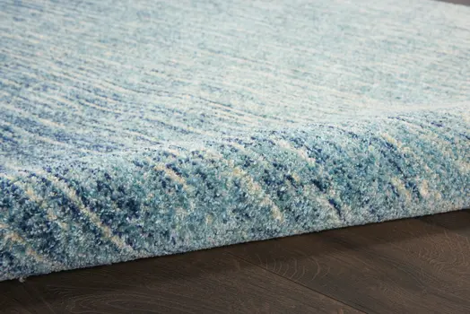 4' X 6' Blue And Ivory Abstract Area Rug