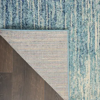 4' X 6' Blue And Ivory Abstract Area Rug