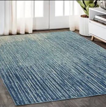 5' X 7' Blue And Ivory Abstract Area Rug