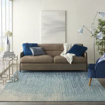 7' X 10' Blue And Ivory Abstract Area Rug