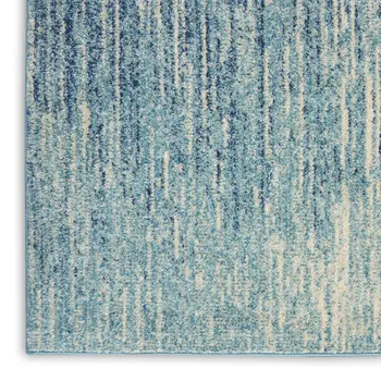 7' X 10' Blue And Ivory Abstract Area Rug