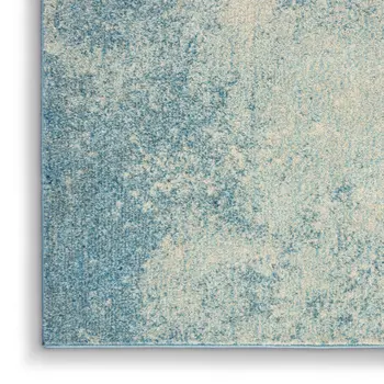 5' X 7' Blue And Ivory Abstract Area Rug