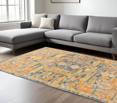 7' X 10' Teal And Gold Medallion Distressed Area Rug