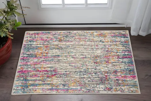2' X 3' Ivory And Blue Abstract Area Rug