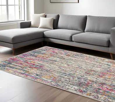 7' X 10' Ivory And Blue Abstract Area Rug