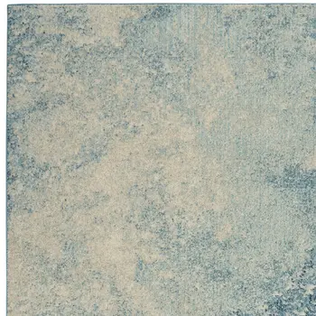 4' X 6' Blue And Ivory Abstract Area Rug