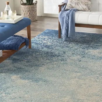 7' X 10' Blue And Ivory Abstract Area Rug