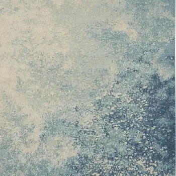 7' X 10' Blue And Ivory Abstract Area Rug