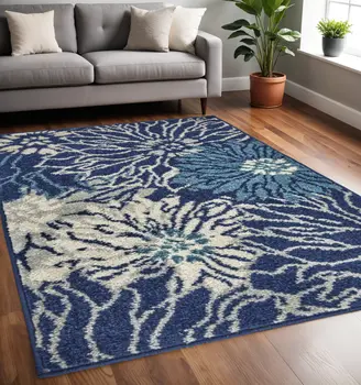 5' X 7' Blue And Ivory Floral Area Rug