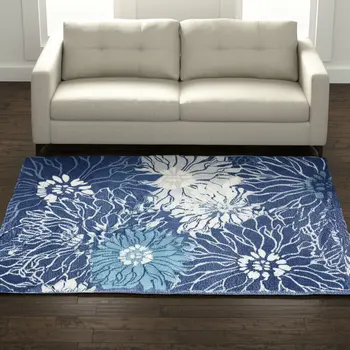 5' X 7' Blue And Ivory Floral Area Rug