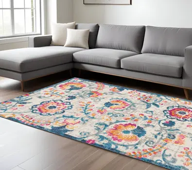 7' X 10' Ivory And Blue Floral Area Rug