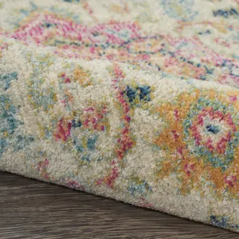 7' X 10' Pink And Ivory Southwestern Distressed Area Rug