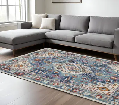 8' X 10' Ivory And Blue Floral Distressed Area Rug