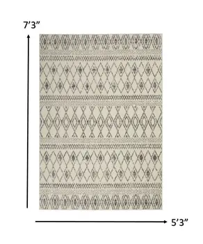 5' X 7' Gray And Ivory Geometric Area Rug