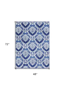 4' X 6' Blue And Ivory Damask Distressed Area Rug