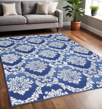 5' X 7' Blue And Ivory Damask Distressed Area Rug