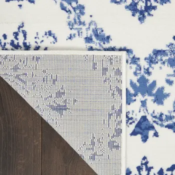 6' X 9' Ivory And Blue Damask Distressed Area Rug