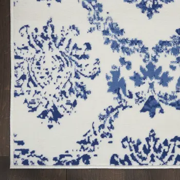 6' X 9' Ivory And Blue Damask Distressed Area Rug