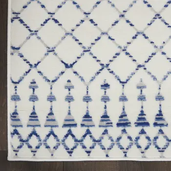 6' X 9' Ivory And Blue Geometric Area Rug