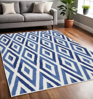 5' X 7' Ivory And Blue Geometric Area Rug