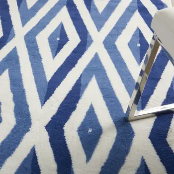 5' X 7' Ivory And Blue Geometric Area Rug