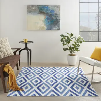 6' X 9' Ivory And Blue Geometric Area Rug