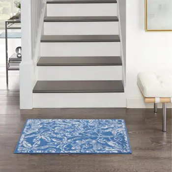 6' X 9' Blue And Ivory Floral Distressed Area Rug