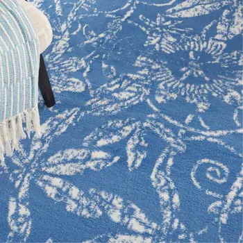 6' X 9' Blue And Ivory Floral Distressed Area Rug