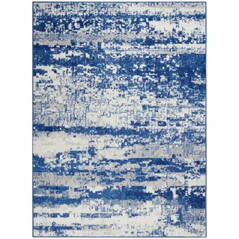 5' X 7' Ivory And Blue Ombre Distressed Area Rug