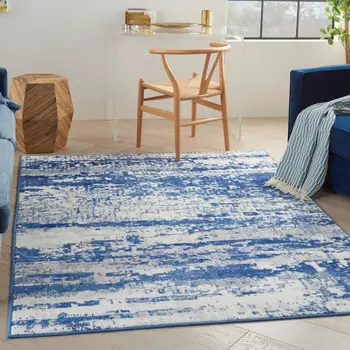5' X 7' Ivory And Blue Ombre Distressed Area Rug