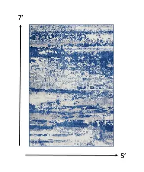 5' X 7' Ivory And Blue Ombre Distressed Area Rug